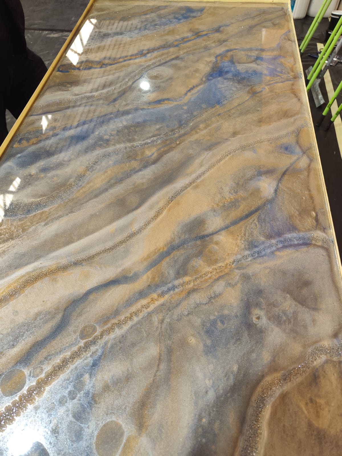 Gold and grey metallic epoxy surface